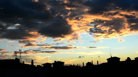 Sunrise, clouds moving and some reays of sun Stock-Footage 12422239