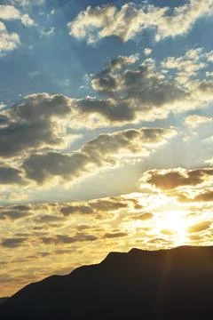 Sunrise with clouds Stock Photos