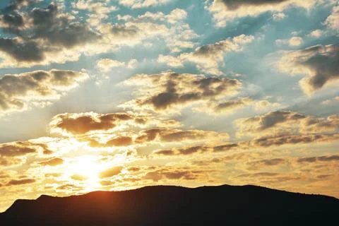 Sunrise with clouds Stock Photos