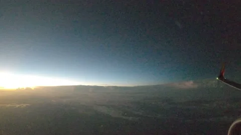 Sunrise in the clouds (raw) Stock Footage 208110484