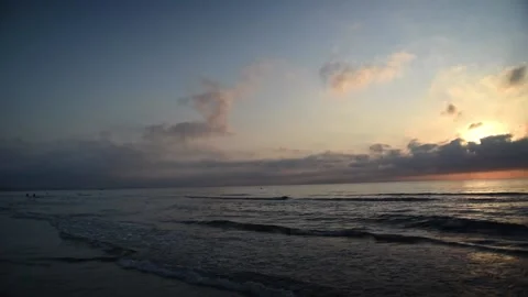 Sunrise with clouds on Valencia beach with side view from side to side Stock Footage 134054154