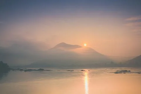 Sunrise cloudy of  landscape view in front of river Stock Photos