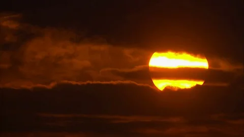 Sunrise with dark ominous foreboding clouds Stock Footage 73766497