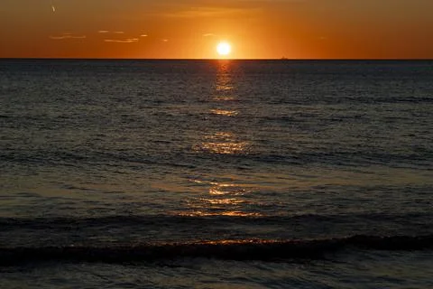 Sunrise. Dawn.  The first rays of sunlight rising Stock Photos