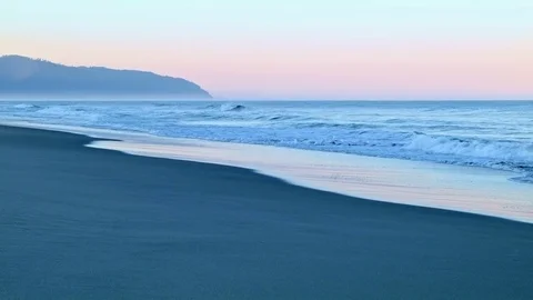 Sunrise dawn waves on beach Cape Kiwanda Oregon Coast Oregon 30 Stock Footage 81897119