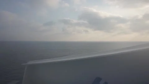 Sunrise from the deck of a ship sailing in the ocean. Stock-Footage 135383482