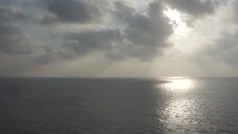 Sunrise from the deck of a ship sailing in the ocean. Stock-Footage 135384594