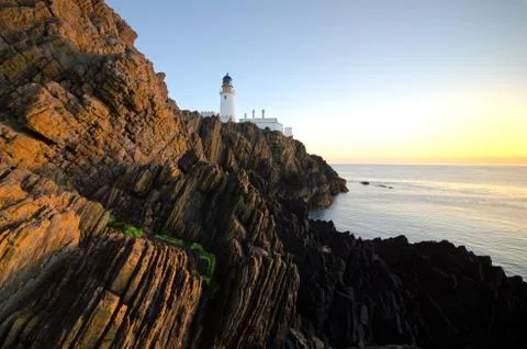 Sunrise at Douglas Lighthouse with Cliffs 写真素材