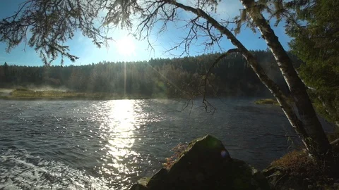 Sunrise down by the river in Lapland Slow motion Stock Footage 112921240