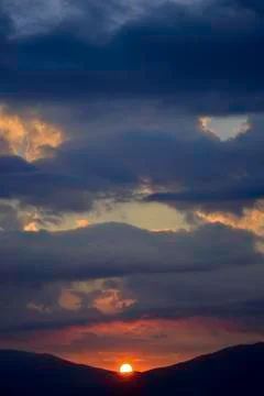 Sunrise with dramatic sky Stock Photos