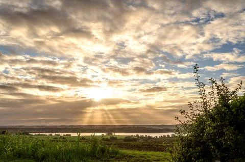 Sunrise with dramatic sky Stock Photos