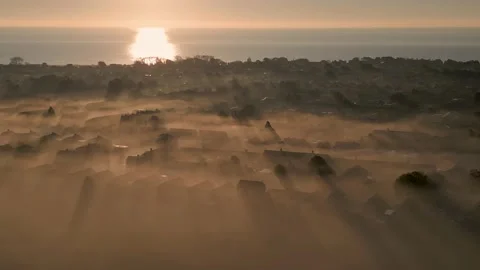 Sunrise Drone flight over Misty landscape Stock Footage 223790744