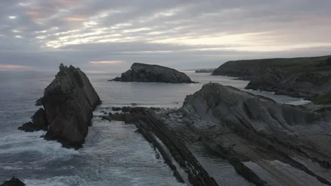 Sunrise drone point of view of Cliffs and Ocean in Spain 4K Stock Footage 137706155