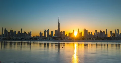 Sunrise in dubai hyperlapse or timelapse view from boat or sea. The Sun rises Stock Footage 128488668