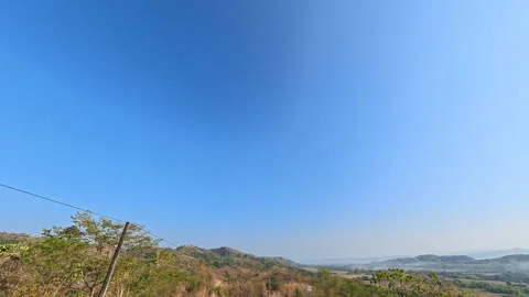 Sunrise far view scenic mountain highway road, camera up level Stock Footage 334985853