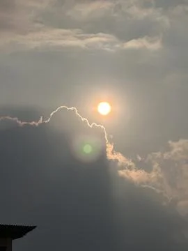 Sunrise With Flare Over Clouds Stock Photos