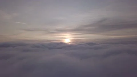 Sunrise Flight Over the Clouds Stock-Footage 139301756