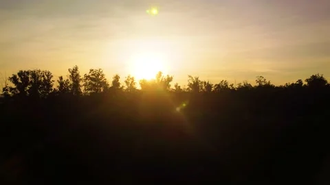 Sunrise, flight over a small town in Brazil highlighting late summer sunris.. Video stock 240008309