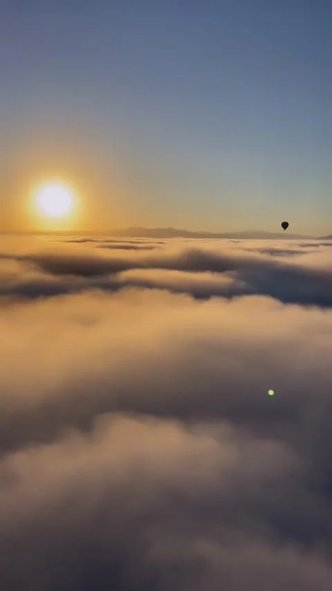 Sunrise floating above the clouds Stock Footage 217423307