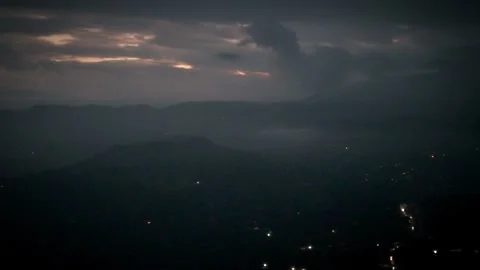 Sunrise Glow Breaks Over Cloudy Valley — High-Altitude Aerial Video stock 316795367