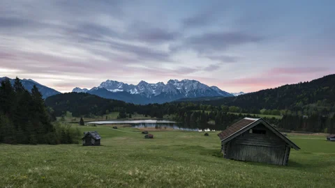 Sunrise Glow at Geroldsee with Mountain Reflection - 4K Timelapse Stock Footage 332662900