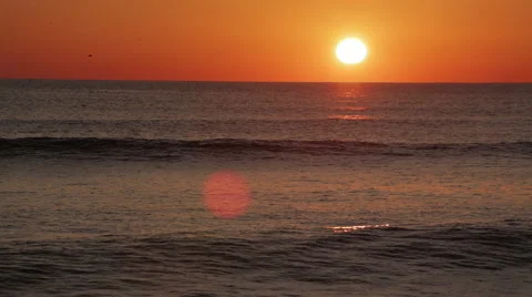 Sunrise glow on waves Stock Footage 46699475