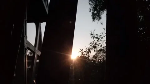 Sunrise hiding among the trees Stock Footage 191237972