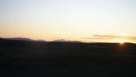 Sunrise on hills view from car while driving Stock Footage 197457692