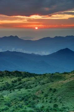 Sunrise in hillside Stock Photos