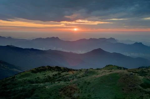 Sunrise in hillside Stock Photos