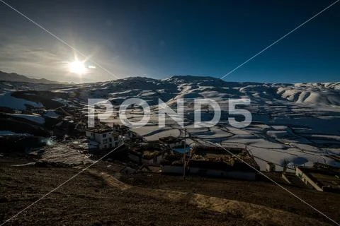 Sunrise in Himalayan Village - Sun star burst in mountains Stock Photos