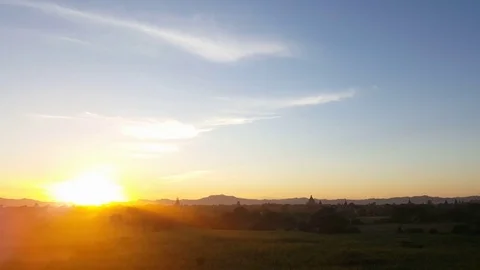 Sunrise on the horizon, Bagan landscape, distant pagodas silhouette, Myanmar Video stock 78656155