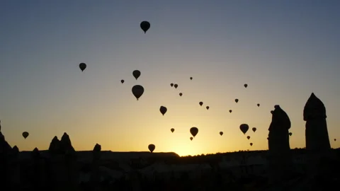 Sunrise Hot Air Balloons Over Cappadocia's Fairy Chimneys Stock Footage 282929209