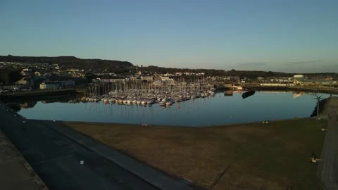 Sunrise in Howth Harbour, one of the north part of Dublin Stock Footage 166626395