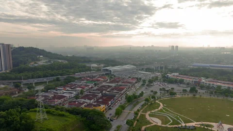 Sunrise hyperlapse areal view of LRT Station, Putra Heights, Malaysia Stock Footage 317974915