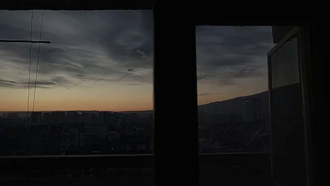 Sunrise from inside an apartment with dirty windows Stock Footage 83498910
