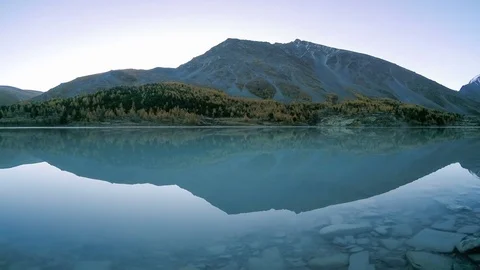 Sunrise on Lake Akkemskoe with a View of the Belukha Mountain, Altai Stock Footage