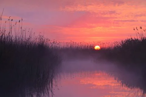 Sunrise lake Stock Photos