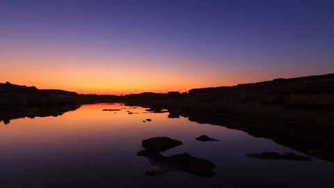 Sunrise at the lake in Sam Phan Bok Stock Footage