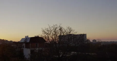 Sunrise light with clouds over city Stock Footage 145877858