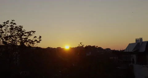 Sunrise light with clouds over city Video stock 145878224