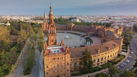 Sunrise light illuminates the iconic Plaza de Espana complex in Seville Stock Footage 341754828