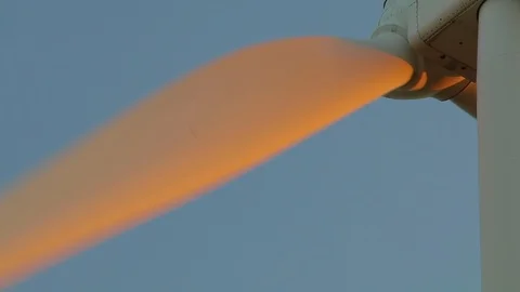 Sunrise light on wind mill while spinning. Copy space. Green energy source Stock Footage 93368459