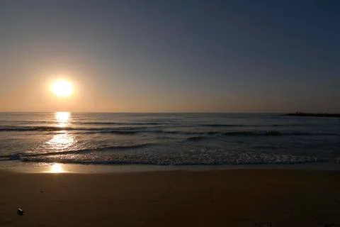 Sunrise on lonely beach, Stock Photos