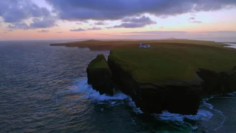 Sunrise at Loop Head Peninsula, Co. Clare. Aerial dolly reveals dramatic Stock Footage 285522460