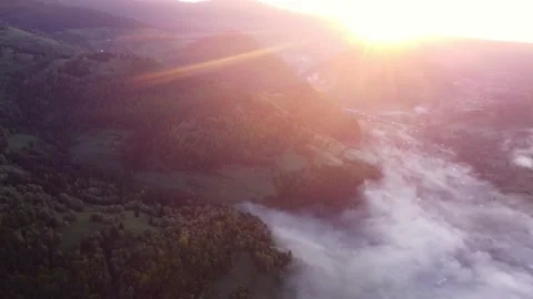 Sunrise , misty a cloud inversion in a rural valley in mountain rural landscape Stock Footage 201164855