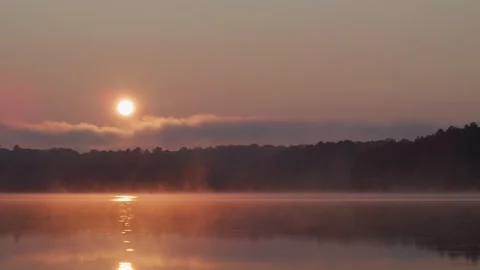 Sunrise on Misty Lake Stock Footage 113215626