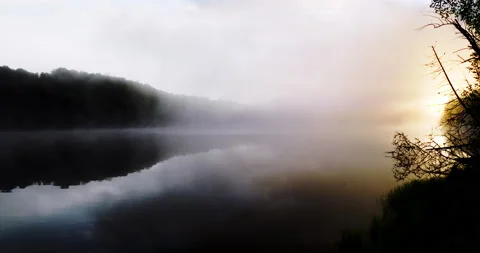 Sunrise at a misty lake Stock Footage 234991410
