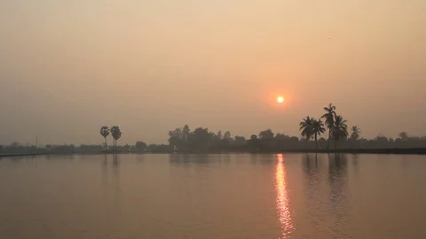 Sunrise in morning reflection 스톡 동영상 73211672