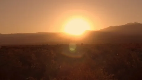 Sunrise Motion time-lapse over mountain range (sunset if inverted) Early morning Stock Footage 125745239